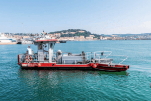 barca aspira rifiuti pelikan